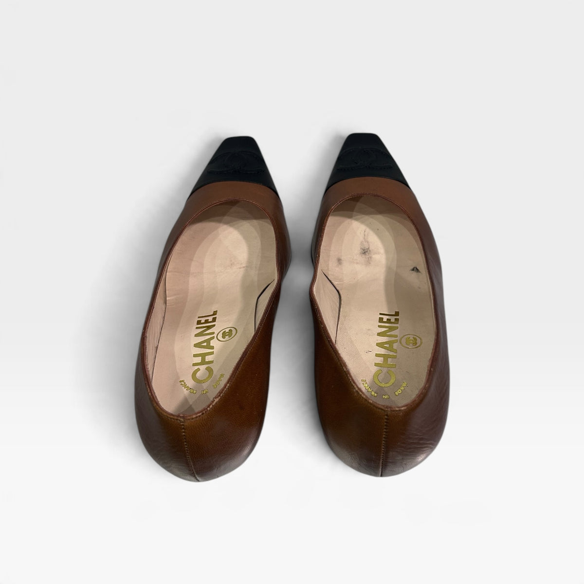 Vintage Chanel Brown & Black Leather Pumps | 1990s