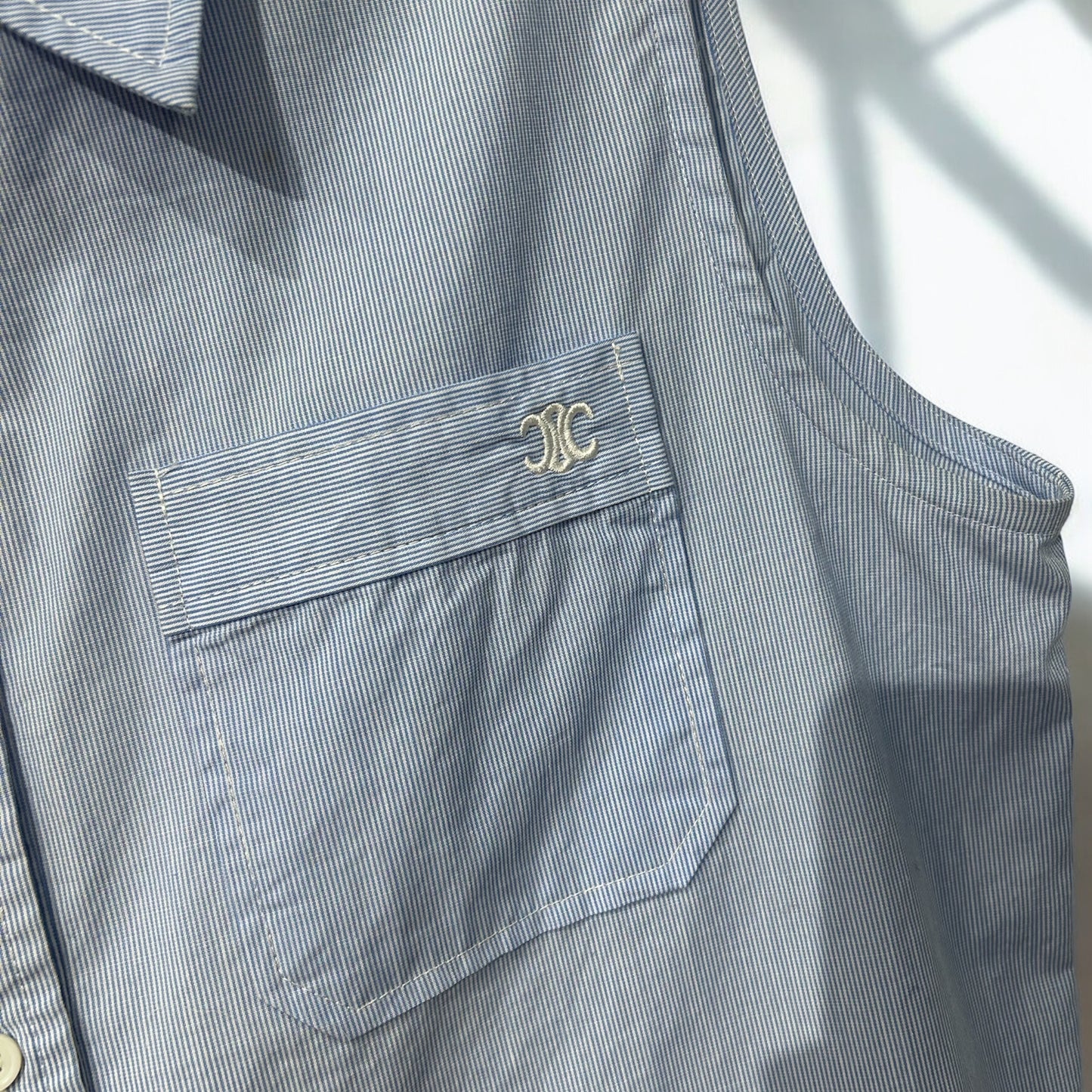 Celine blue sleeveless top