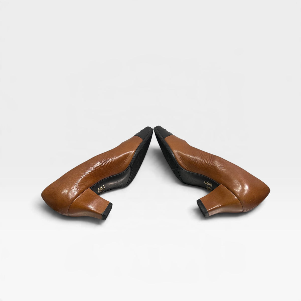 Vintage Chanel Brown & Black Leather Pumps | 1990s