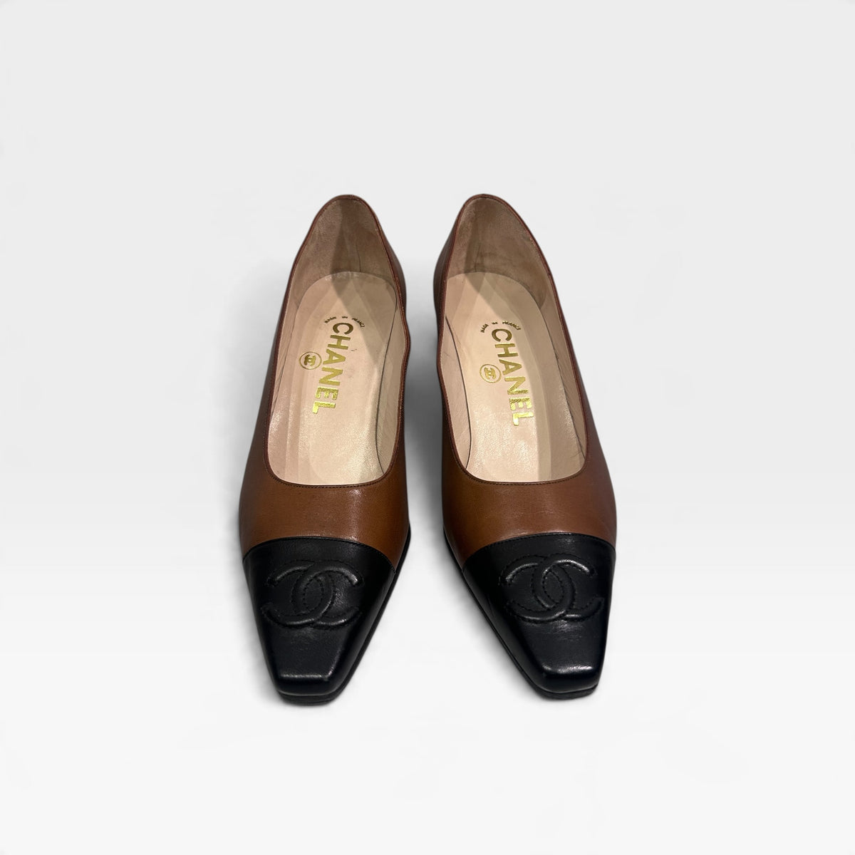 Vintage Chanel Brown & Black Leather Pumps | 1990s