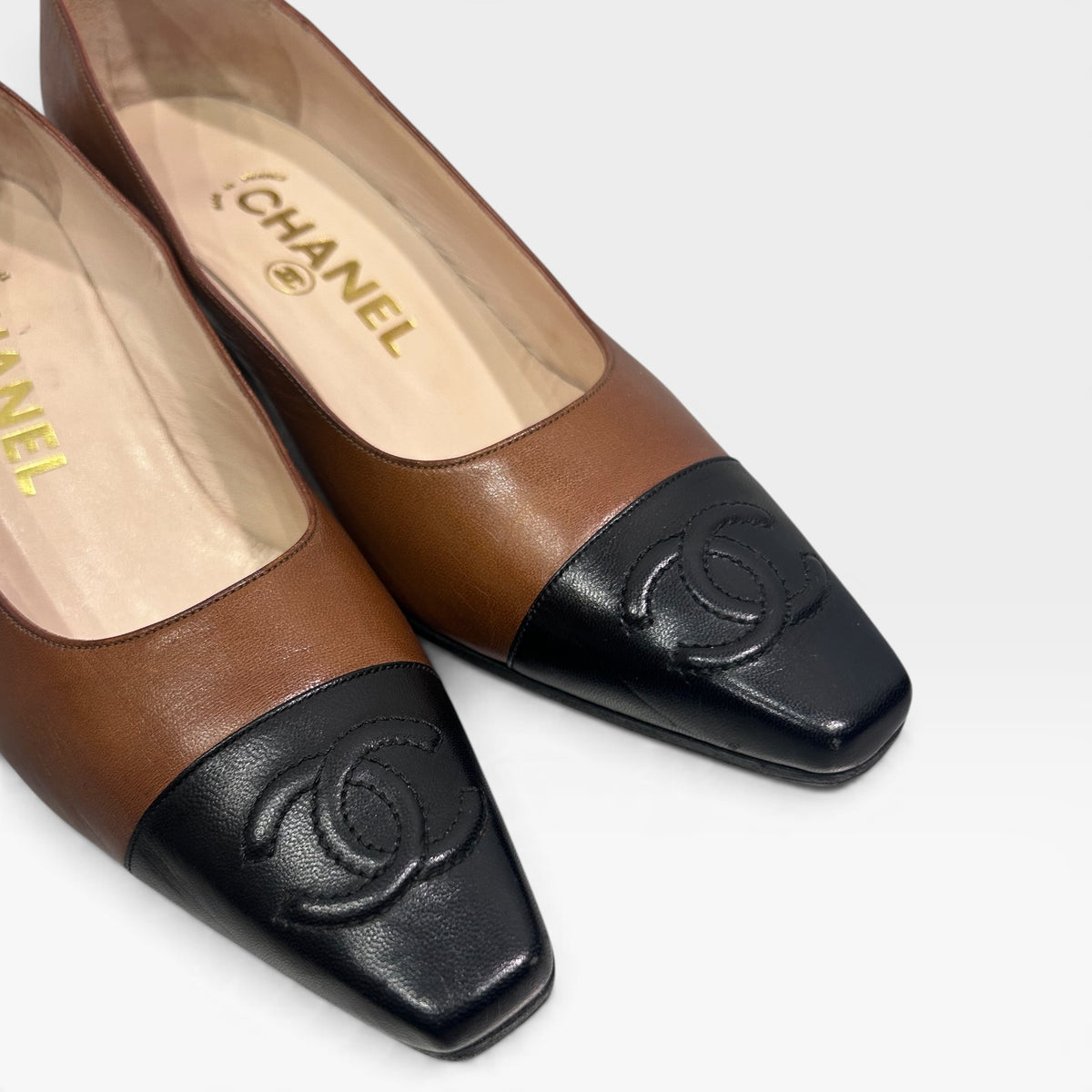 Vintage Chanel Brown & Black Leather Pumps | 1990s