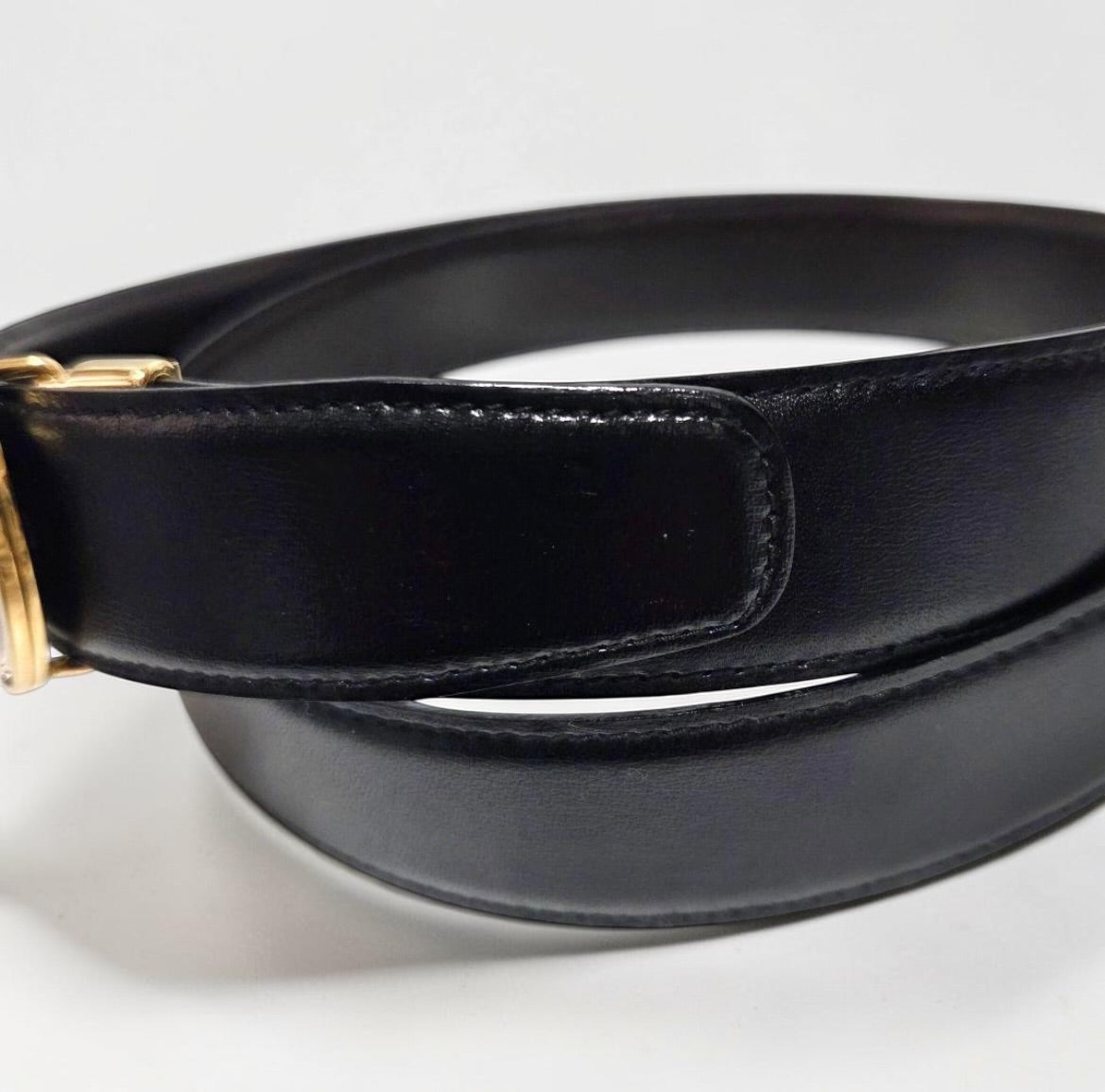 Vintage Longchamp Black Leather Belt with Medallion Buckle | Late 1980s