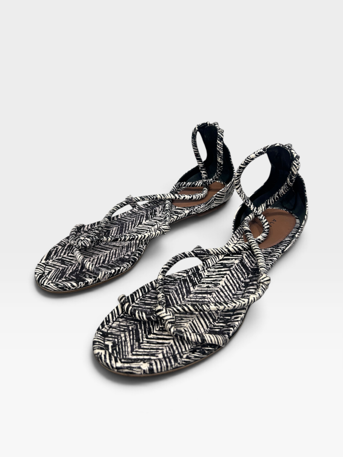 Alaïa Paris Black & White Braided Flat Sandals| 2010