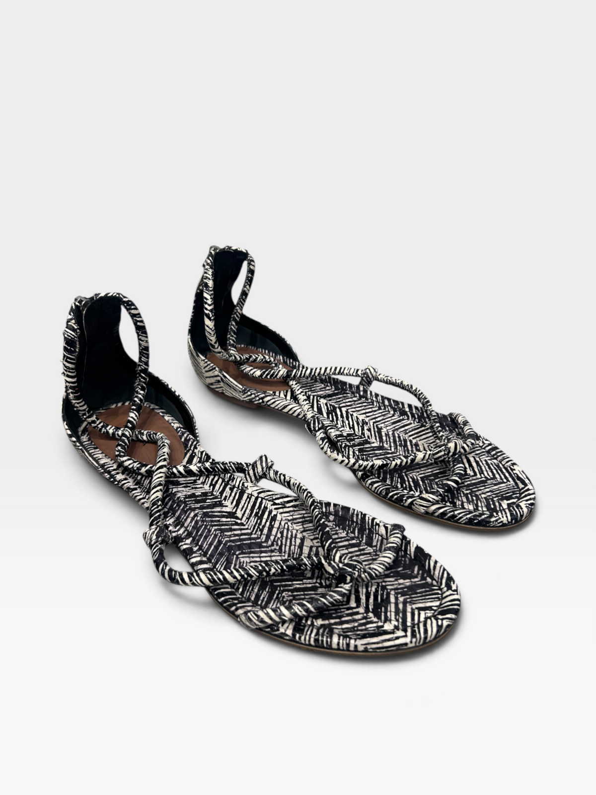 Alaïa Paris Black & White Braided Flat Sandals| 2010