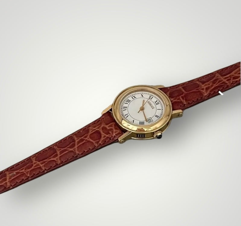 Vintage Gucci Swiss-Made Gold Roman Dial Watch