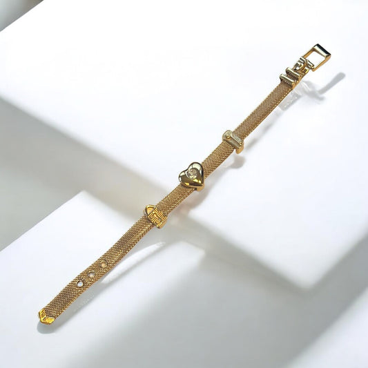 Vintage Givenchy Gold Mesh Bracelet with Heart Crystal Charm