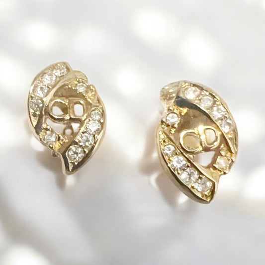 Vintage (and Rare) Dior clip on gold pleated earrings